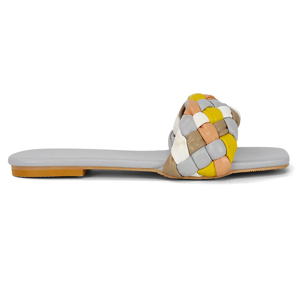 DARCIE WOVEN STRAP SQUARE TOE FLAT SLIDER SANDAL IN NUDE MULTI SYNTHETIC LEATHER